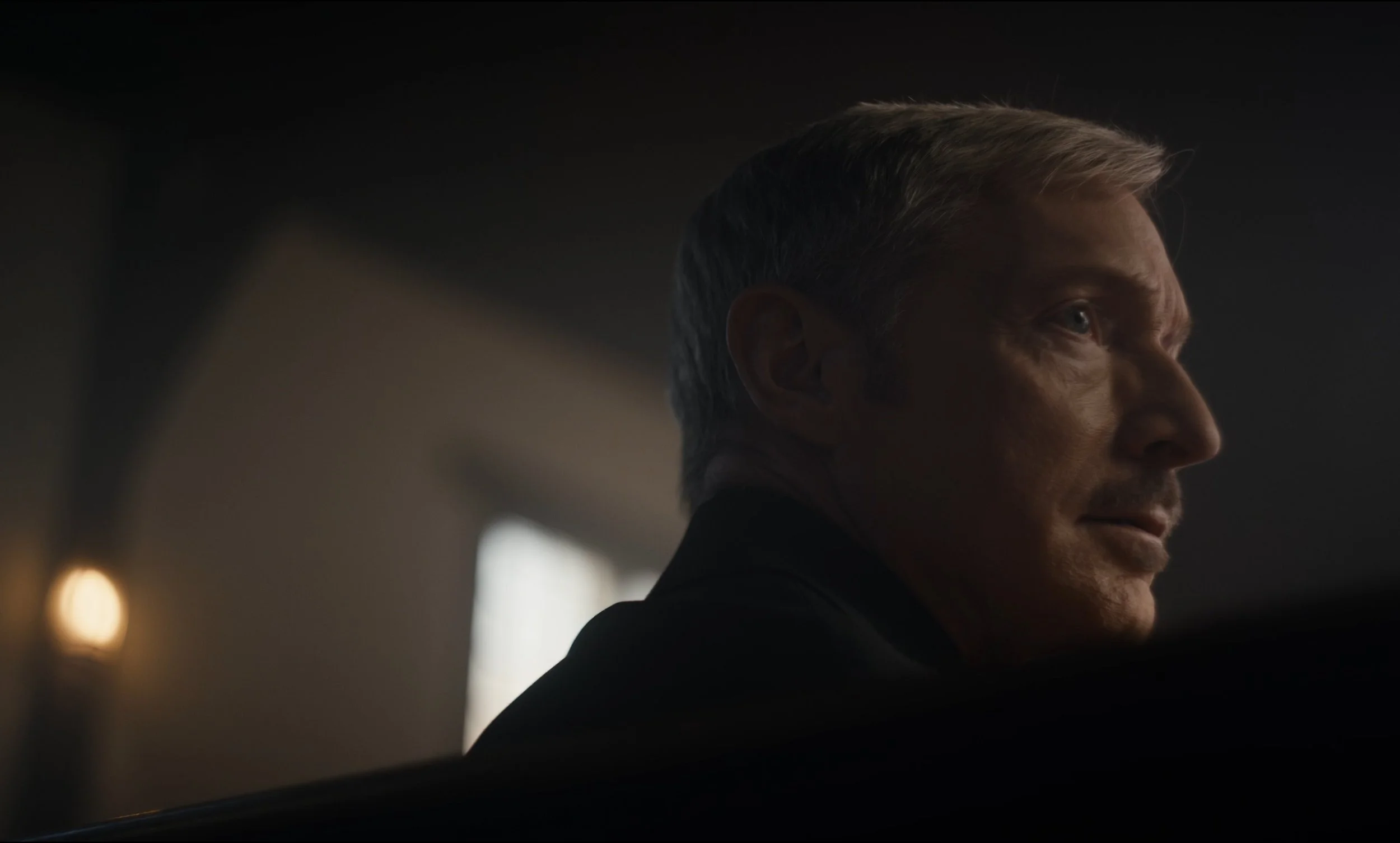 Portrait of an older man inside a church