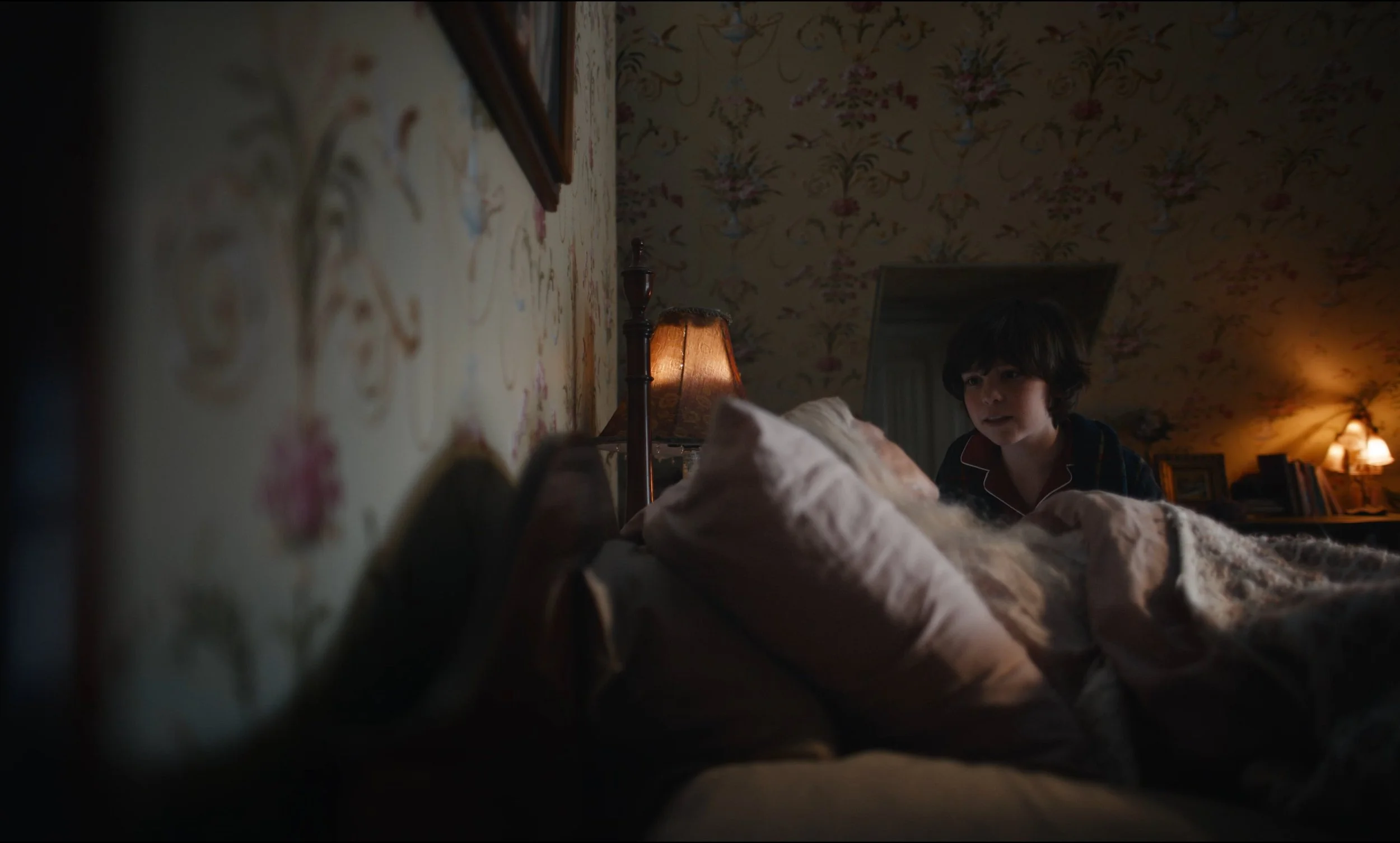 Toby standing in his bedroom